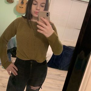 Green knitted sweater